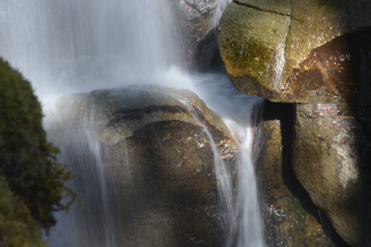 waterfalling over rocks